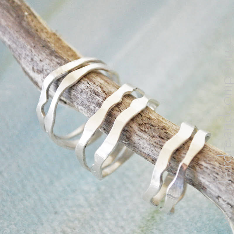 Sterling silver double banded ring, grouping of three rings.